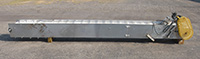 Used STAINLESS STEEL ELEVATING BELT CONVEYOR, 18 inches wide by 15 feet long; Alard item Y1956