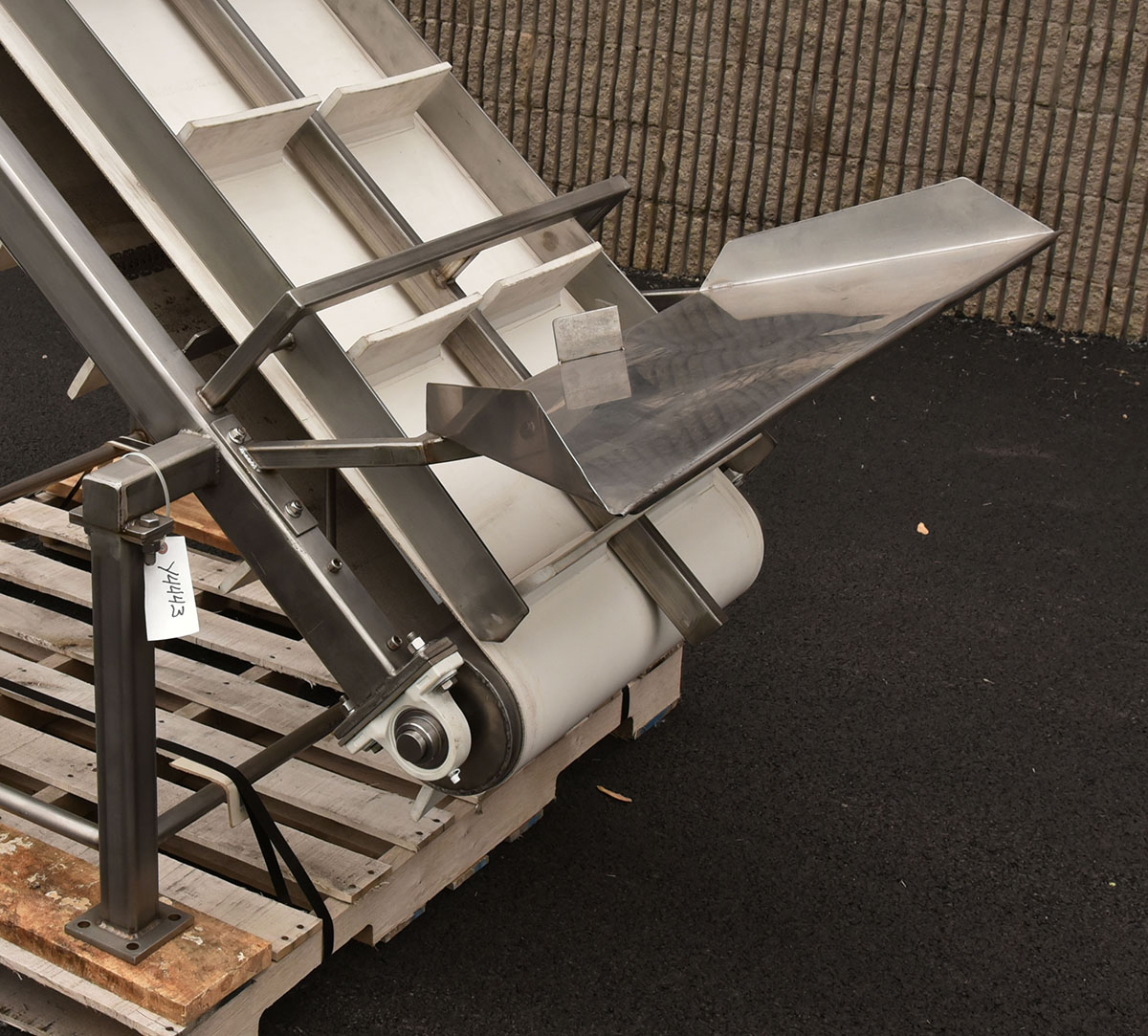 Used INCLINED FEED CONVEYOR,  22 inch wide cleated belt,  food grade, stainless steel, in stock, Alard item Y4443